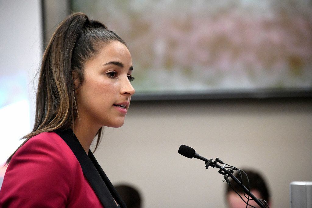 Olympic gold medalist Aly Raisman gives her victim impact statement in Lansing, Mich.,...