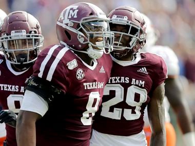 Texas A&M defensive lineman DeMarvin Leal (8) reacts after tackling UTSA quarterback Lowell...