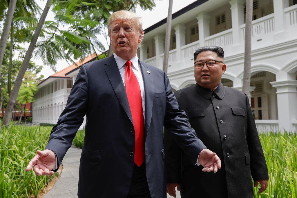 U.S. President Donald Trump and North Korea leader Kim Jong Un stop to talk with the media...