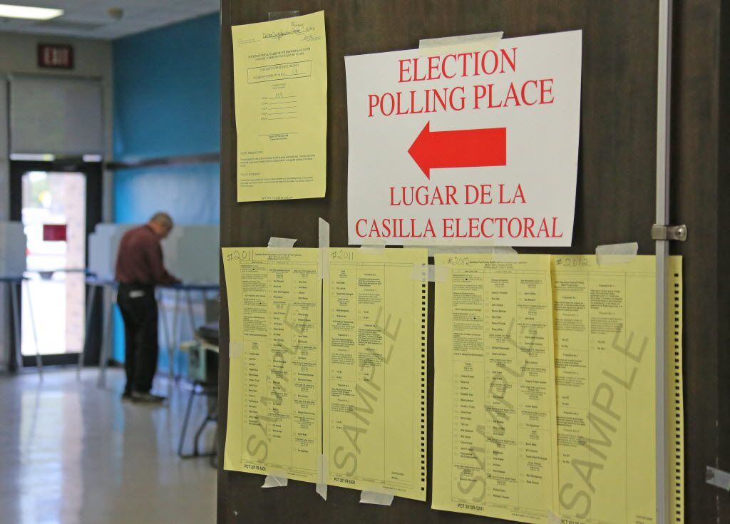 Voters cast their ballots at the Walnut Hill Community Center on Midway Road in Dallas on...