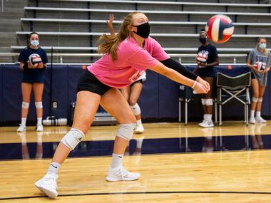 Flower Mound High School volleyball outside hitter Angelique Cyr returns the ball during...