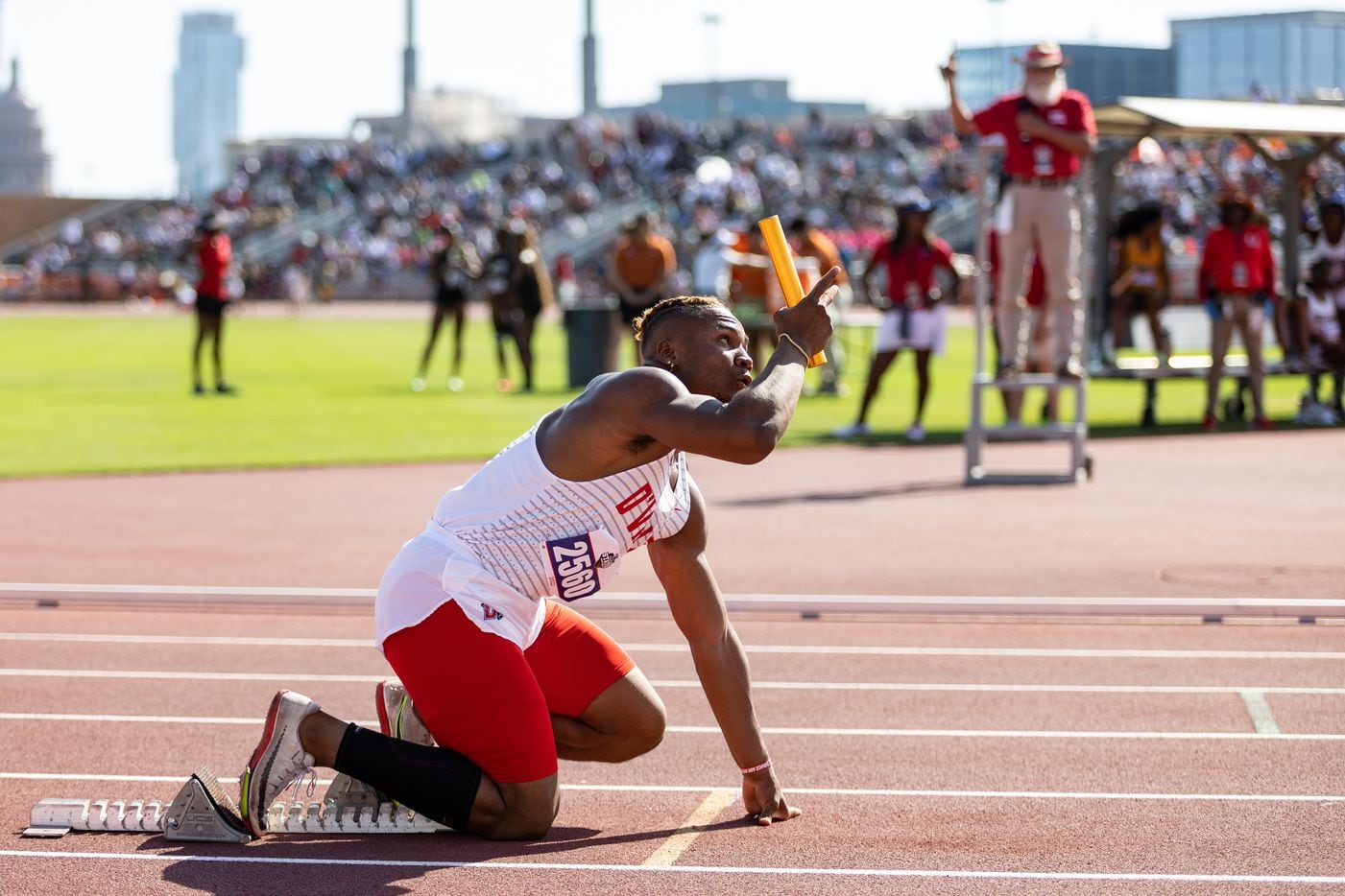 Caden Durham of Duncanville prepares to lead off the boys' 4x100-meter relay at the UIL...