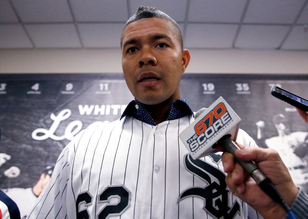 Chicago White Sox pitcher Jose Quintana speaks to reporters during a media reception at the...