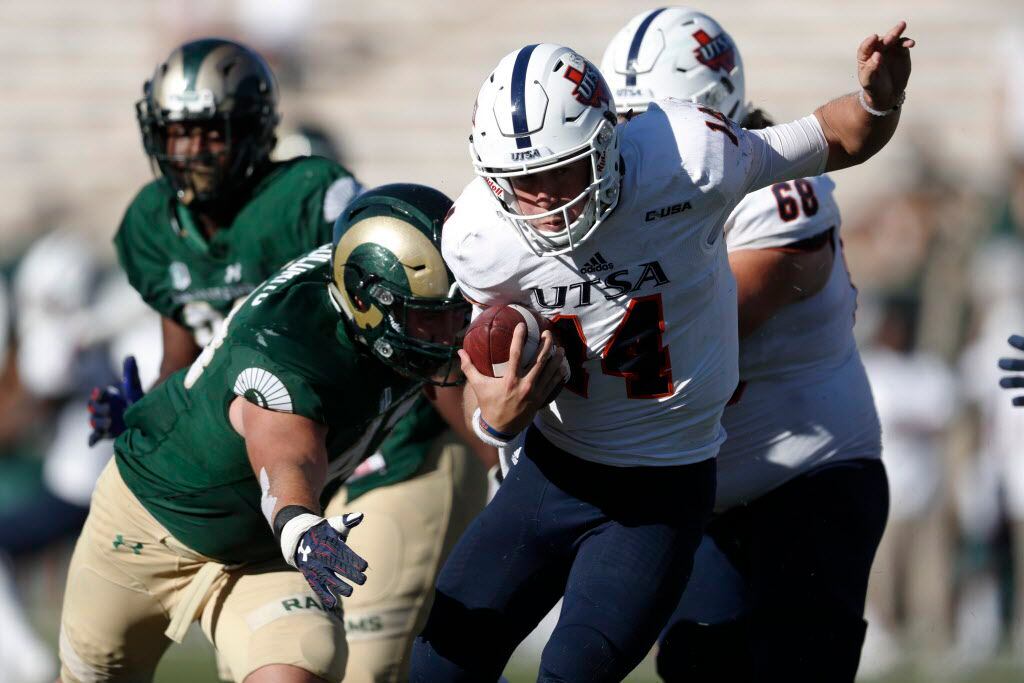 Colorado State linebacker Evan Colorito, left, pursues UTSA quarterback Dalton Sturm in the...