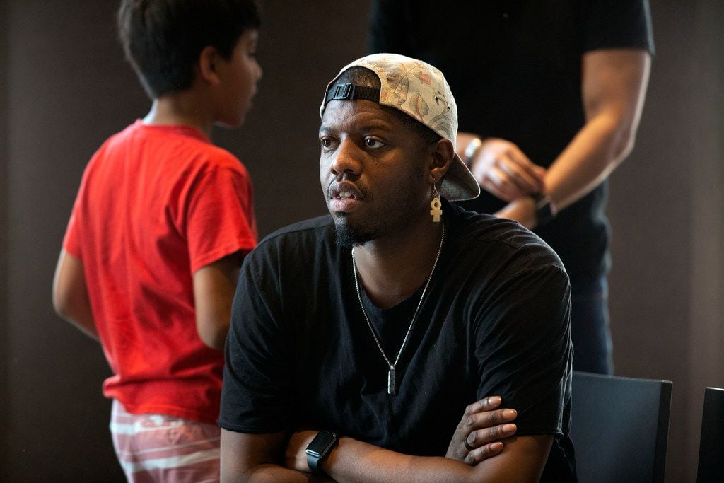 Public Works Dallas director Dayron Miles observes a rehearsal of Dallas Theater Center's...