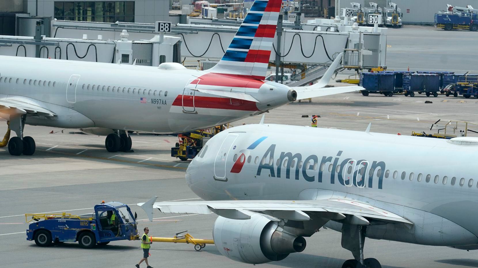 American Airlines jets prepare for departure.
