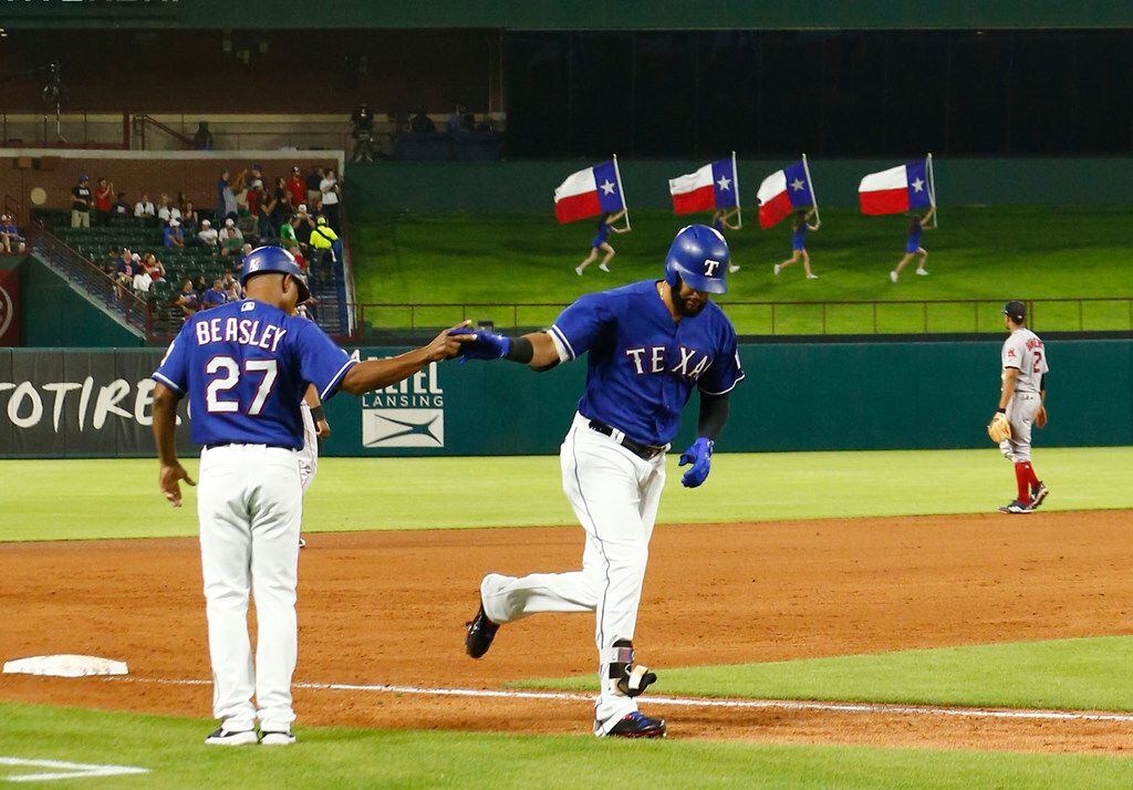 Texas Rangers right fielder Nomar Mazara (30) celebrates hitting a home run in the fourth...
