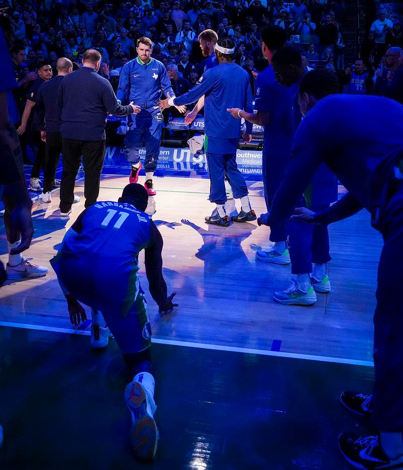 Dallas Mavericks guard Luka Doncic takes the floor before an NBA basketball game against the...