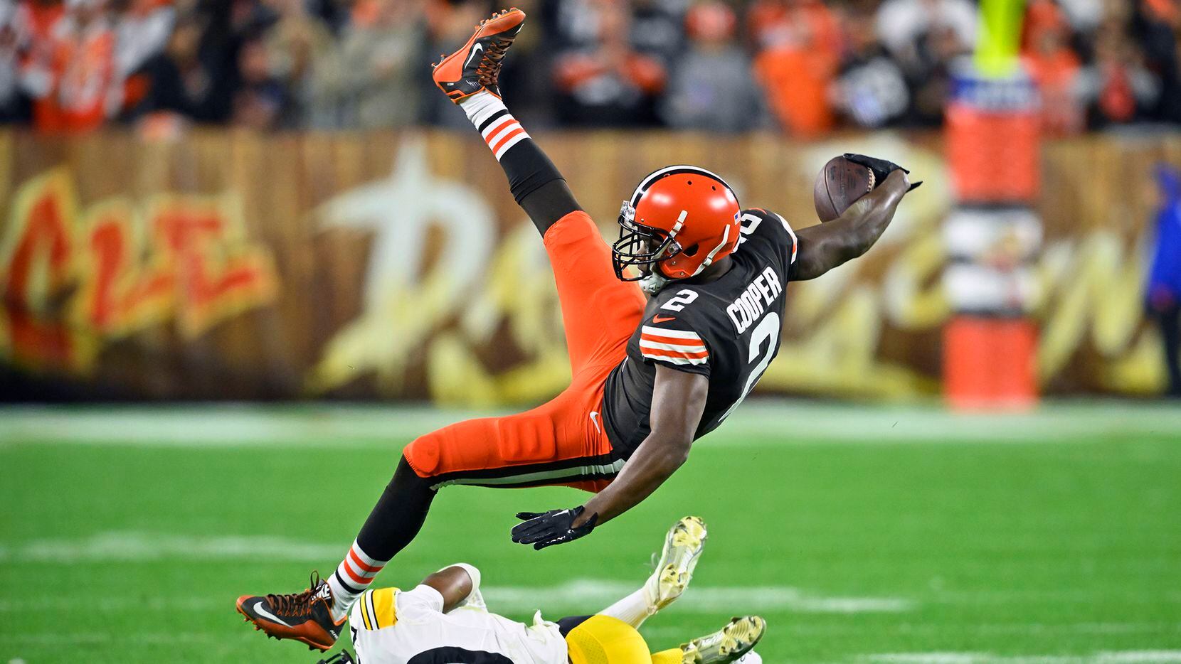 Cleveland Browns wide receiver Amari Cooper (2) is upended by Pittsburgh Steelers cornerback...