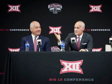 Incoming Big 12 commissioner Brett Yormark  (right) and outgoing commissioner Bob Bowlsby...