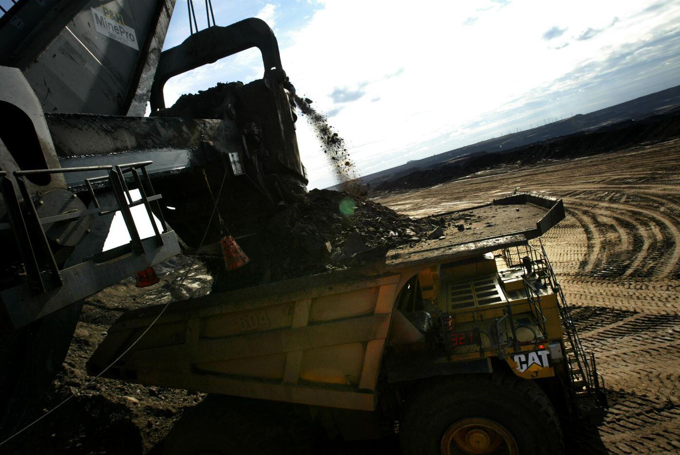 2005 FILE PHOTO -- A heavy hauler is loaded with oil sands from a mine at Syncrude Canada...