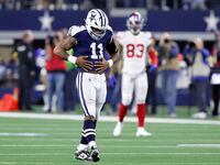 Dallas Cowboys linebacker Micah Parsons (11) celebrates his fourth-quarter sack of New York...