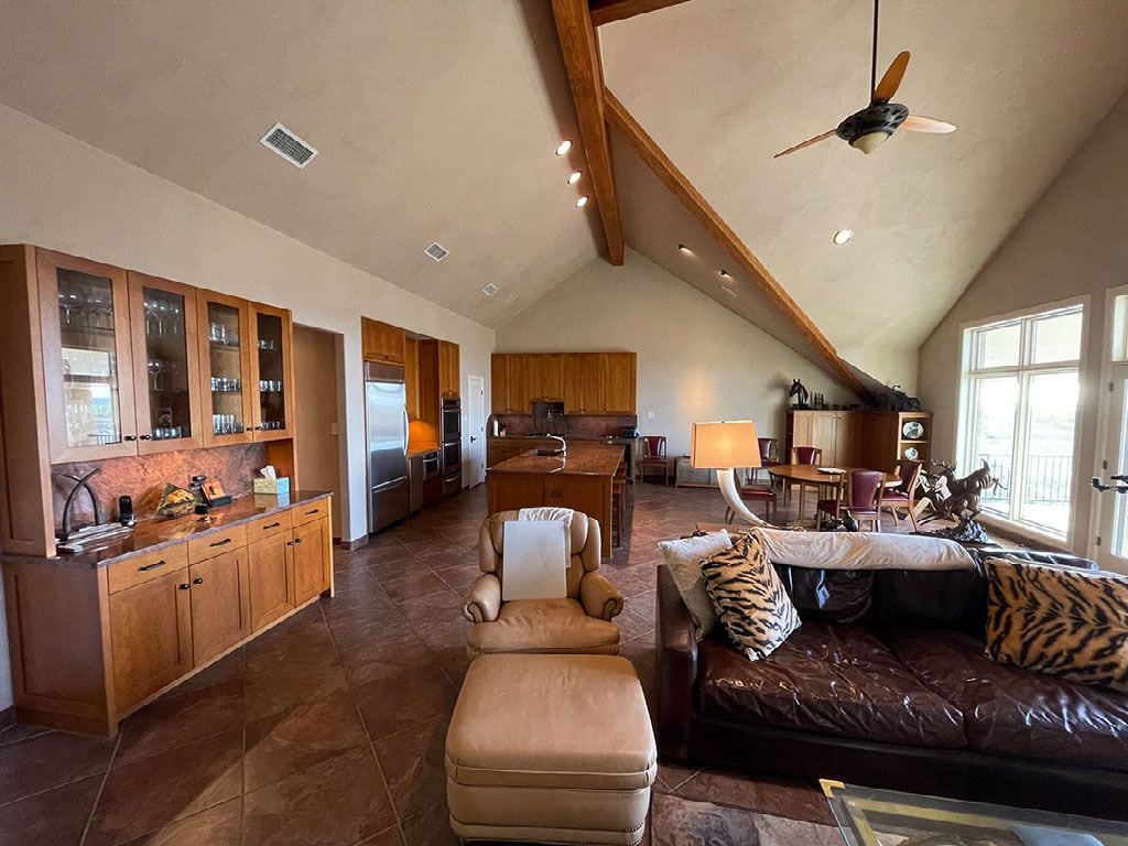 The lodge has three bedrooms, three baths and an open kitchen-living area.