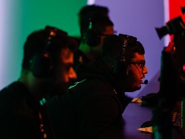 OpTic Texas' Indervir "iLLeY" Dhaliwal (secong from right) along with the rest of the team during a match against Los Angeles Thieves at Call of Duty League at Esports Stadium Arlington in Arlington on Saturday, January 22, 2022.