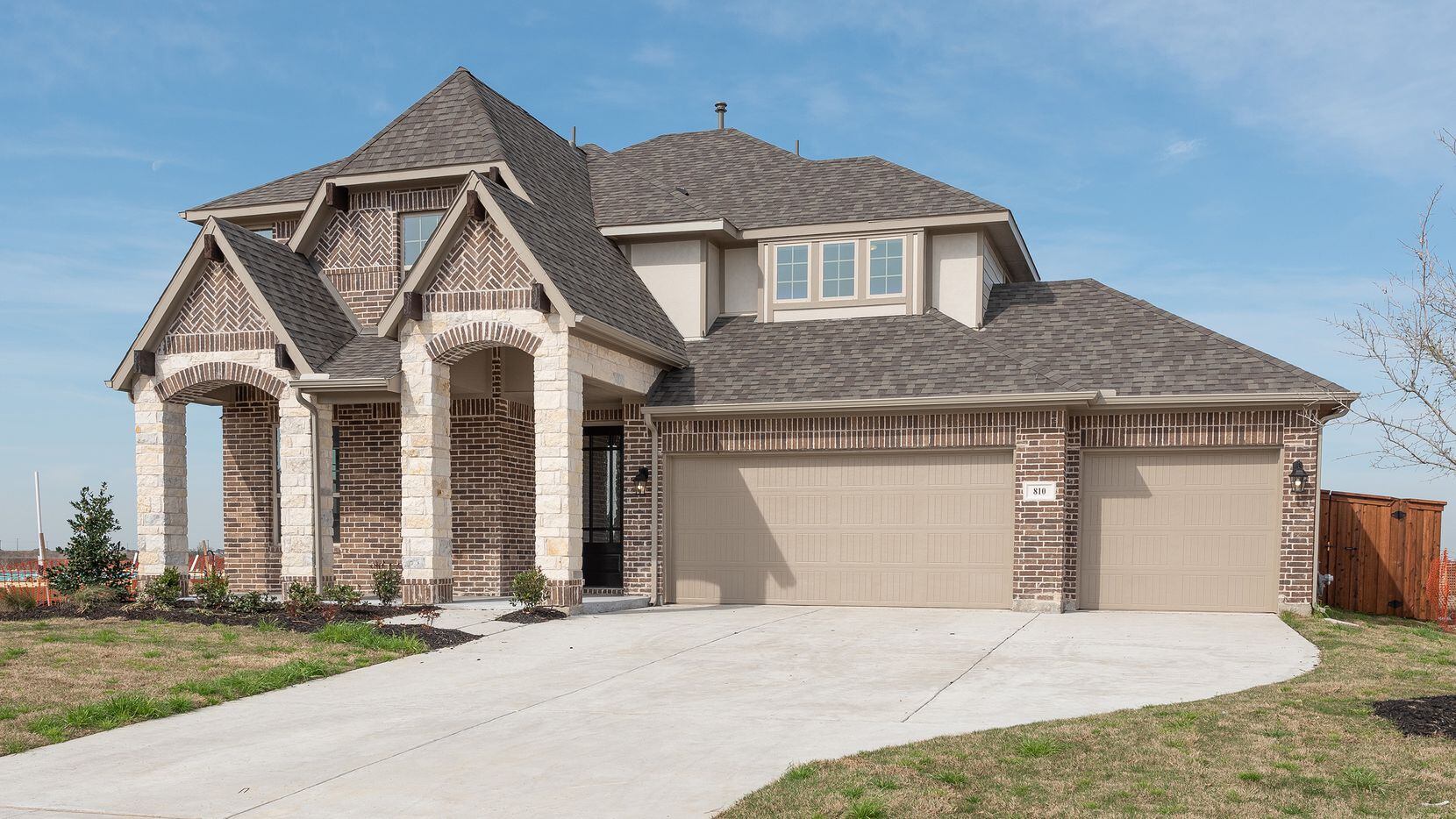 The Duchman design from Pacesetter Homes is located at 810 Grove Vale Drive in Prosper’s...