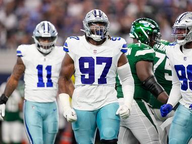 Dallas Cowboys defensive tackle Osa Odighizuwa celebrates after a sack against the New York...