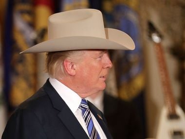U.S. President Donald Trump wears a Stetson cowboy hat while touring a Made in America...