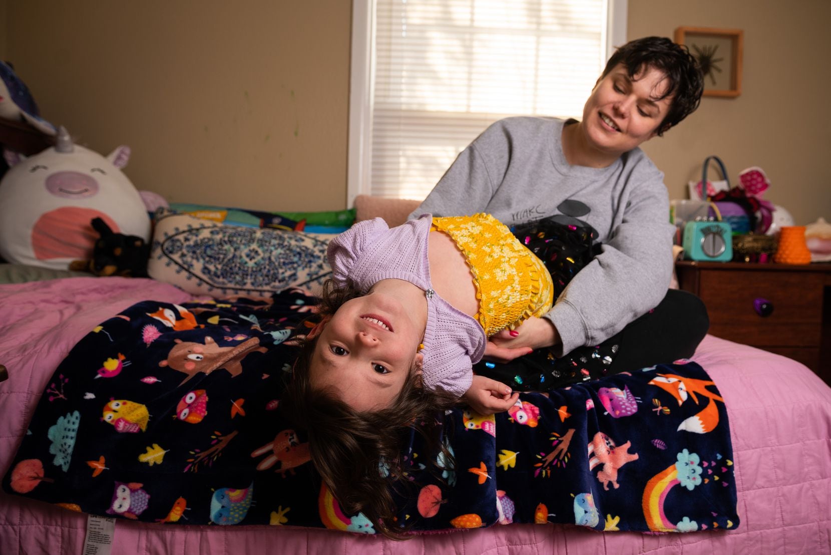 Violet and her trans daughter Isa inside her daughter's bedroom at their home in Dallas, on...