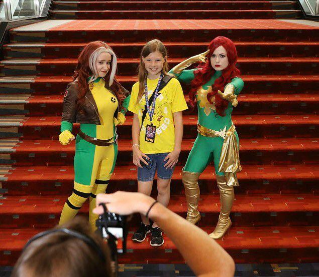 Cosplay, or costume play, actors dress as characters from the X-Men comic books and pose for...