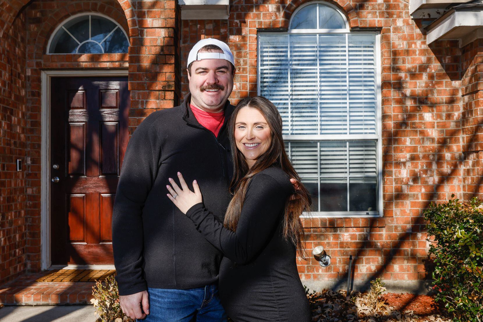 Jessica and Michael Ludden pose together at their home in Frisco on Thursday, Jan. 26. 2023....