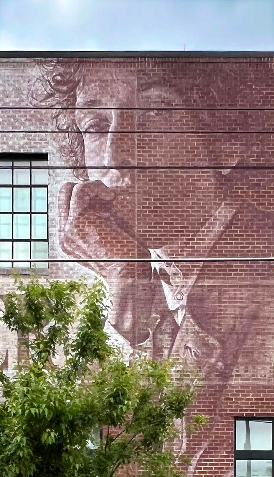A mural graces the exterior of the Bob Dylan Center in Tulsa.