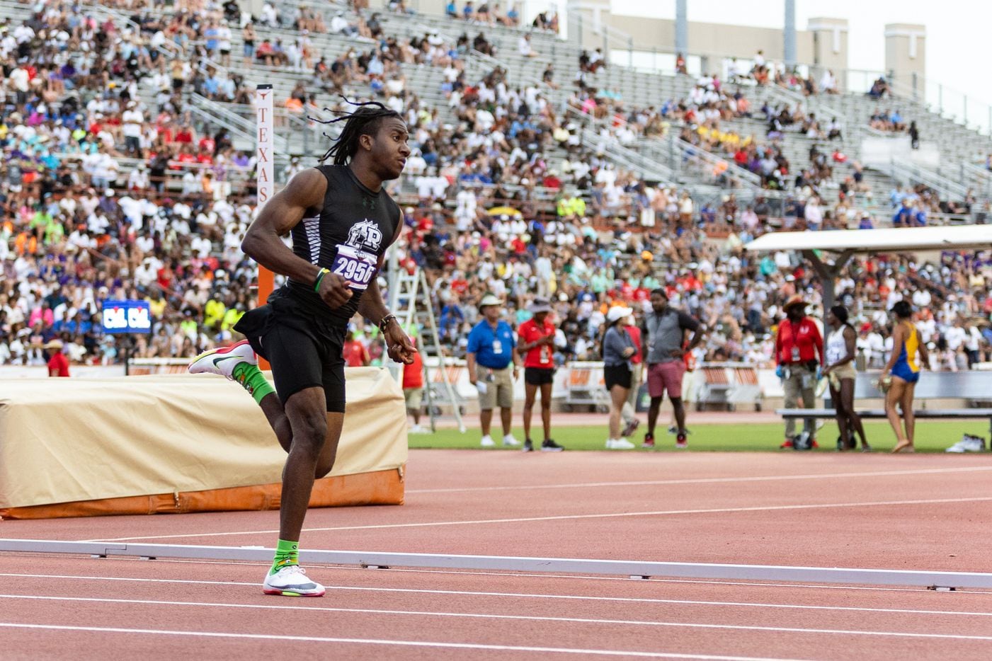 Dominic Byles of Mansfield Lake Ridge races in the boys’ 400-meter dash at the UIL Track &...