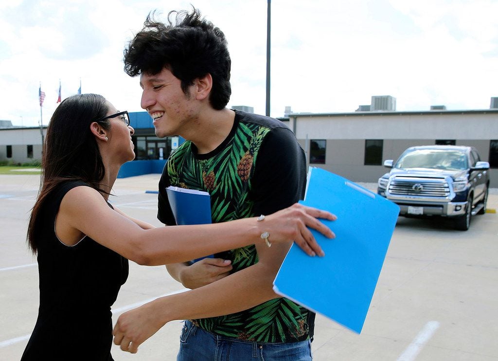 Francisco Galicia, 18, got a hug from his attorney, Claudia Galan, after his release from...