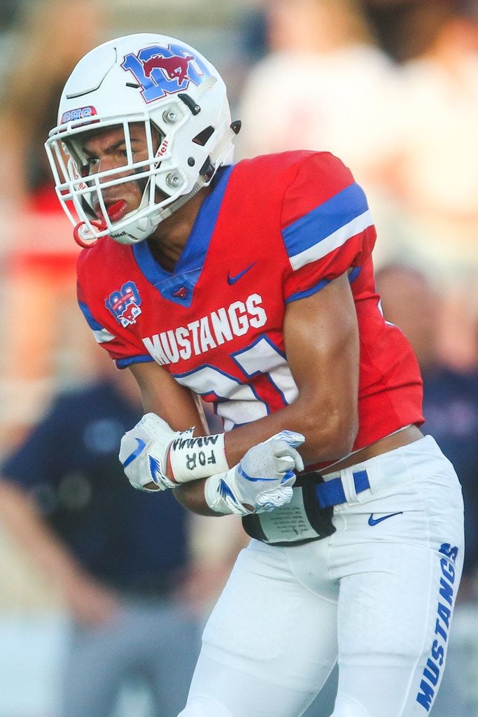 Grapevine defensive back Adriene White (21) celebrates after stopping Northwest's kick...