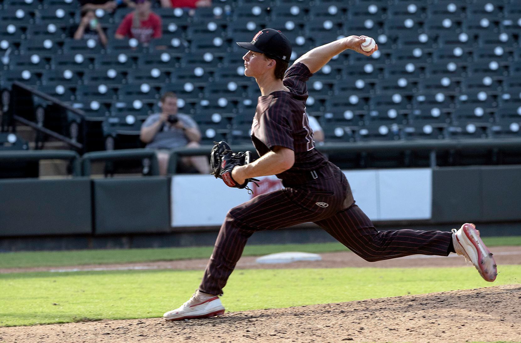 Rockwall-Heath Caden Fiveash, (16), pitches against Keller during the sixth inning of the...