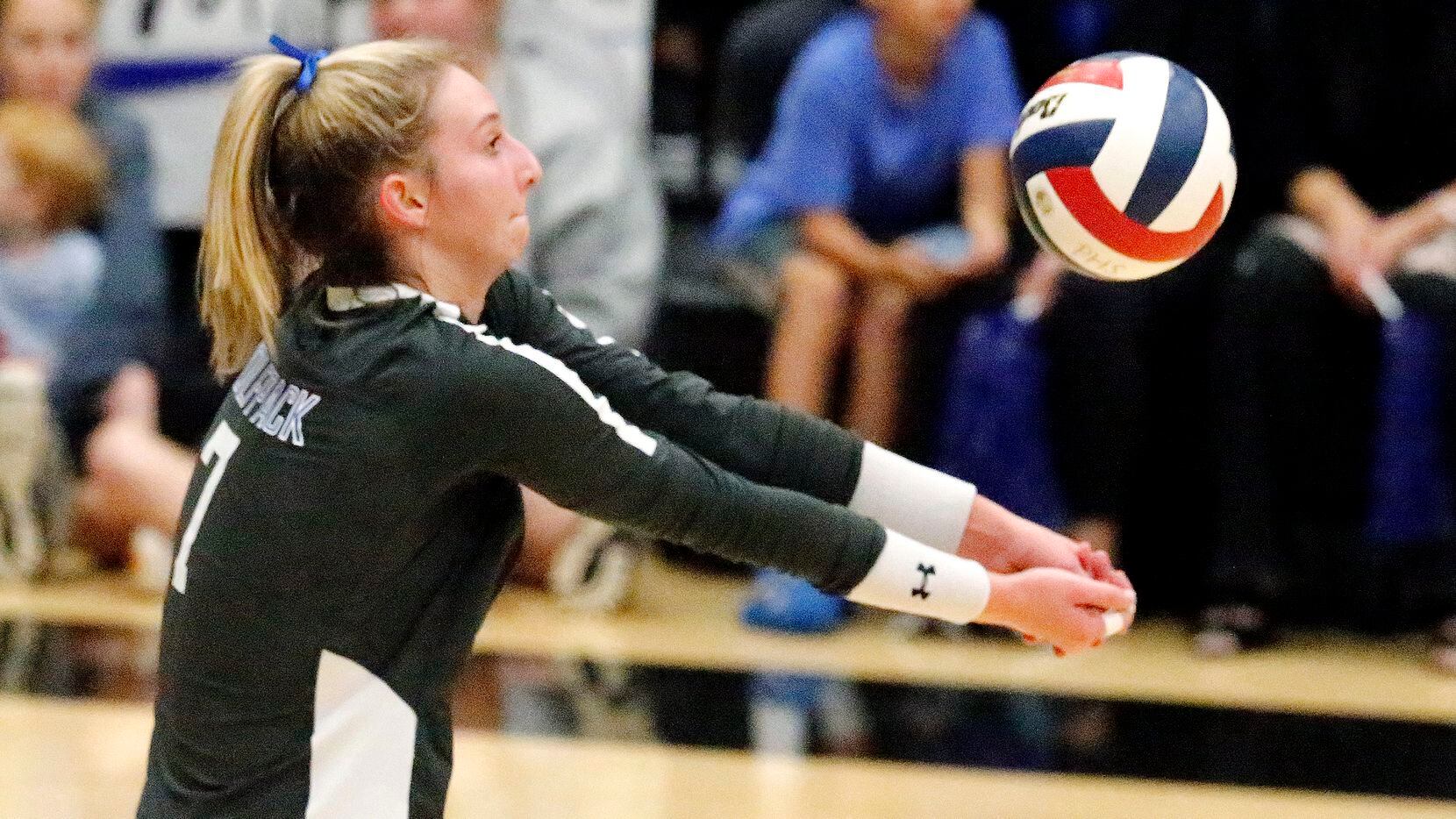 Plano West High School outside hitter Blaire Bayless (7) receives serve during game two as...