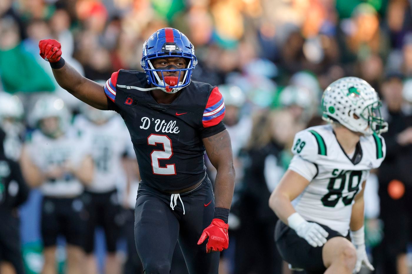 Duncanville linebacker Jordan Crook (2) celebrates a tackle during the first half of their Class 6A Division I state semifinal playoff game against Southlake Carroll at McKinney ISD Stadium in McKinney, Texas, Saturday, Dec. 11, 2021. (Elias Valverde II/The Dallas Morning News)