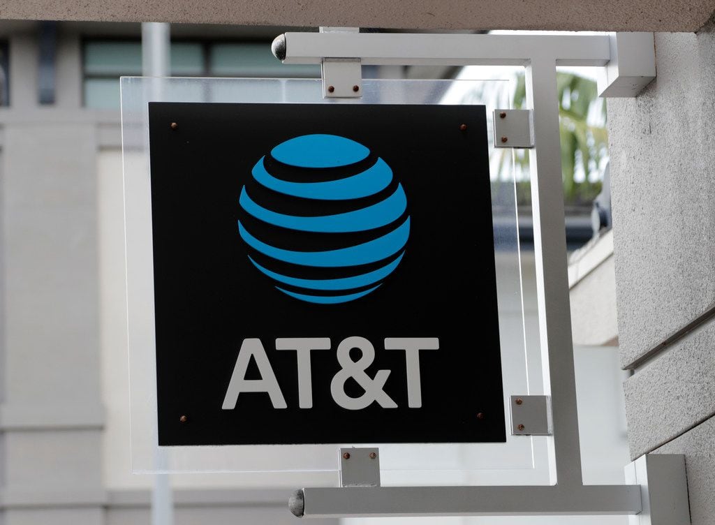 In this Thursday, July 18, 2019 photo, is an AT&T retail store in Miami. (AP Photo/Lynne...