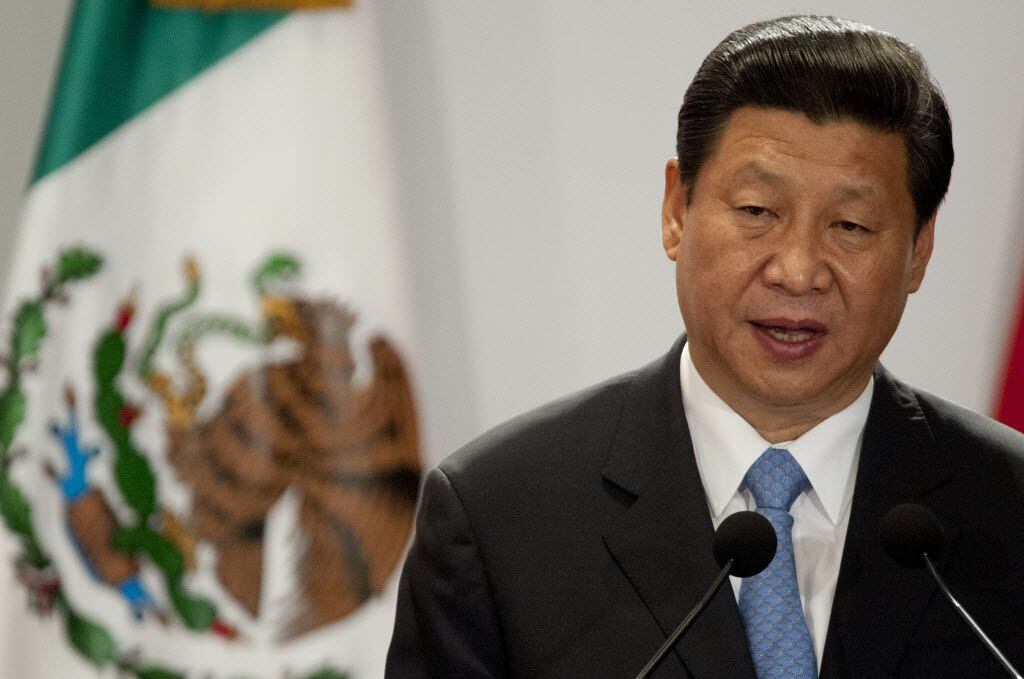 Chinese President Xi Jinping delivers a speech for Mexican and Chinese businessmen during a...