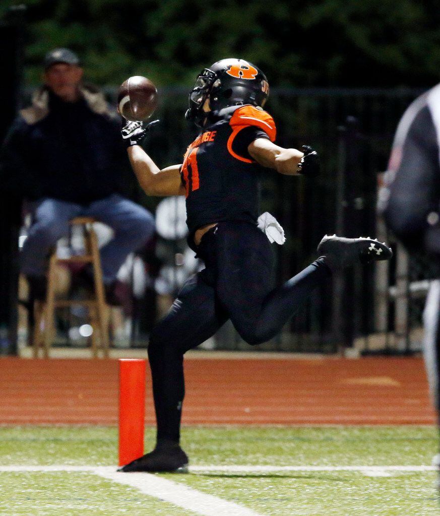 Rockwall WR Jaxon Smith-Njigba (11) makes a one-handed catch at the one-yard-line to setup...