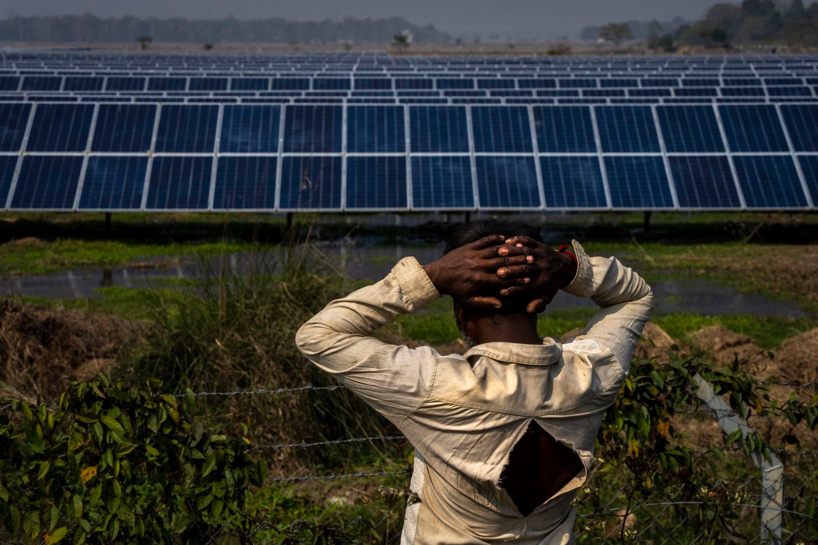 Farmer Sitaram Murmu, 52, whose agriculture land had been transferred to build a solar power...