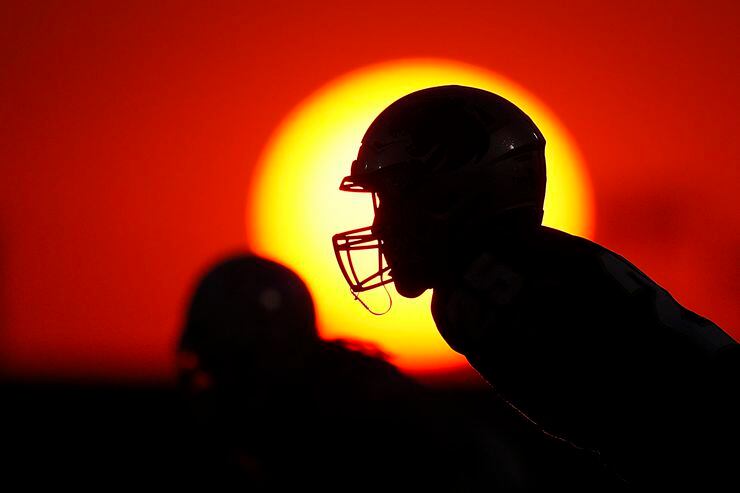 Panther Creek  wide receiver Parker Ord (25) lines up for a kickoff as the sun sets during...