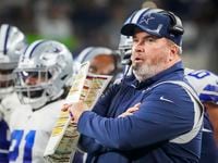 Dallas Cowboys head coach Mike McCarthy watches from the sidelines during the first half of an NFL football game against the Washington Football Team at AT&T Stadium on Sunday, Dec. 26, 2021, in Arlington.