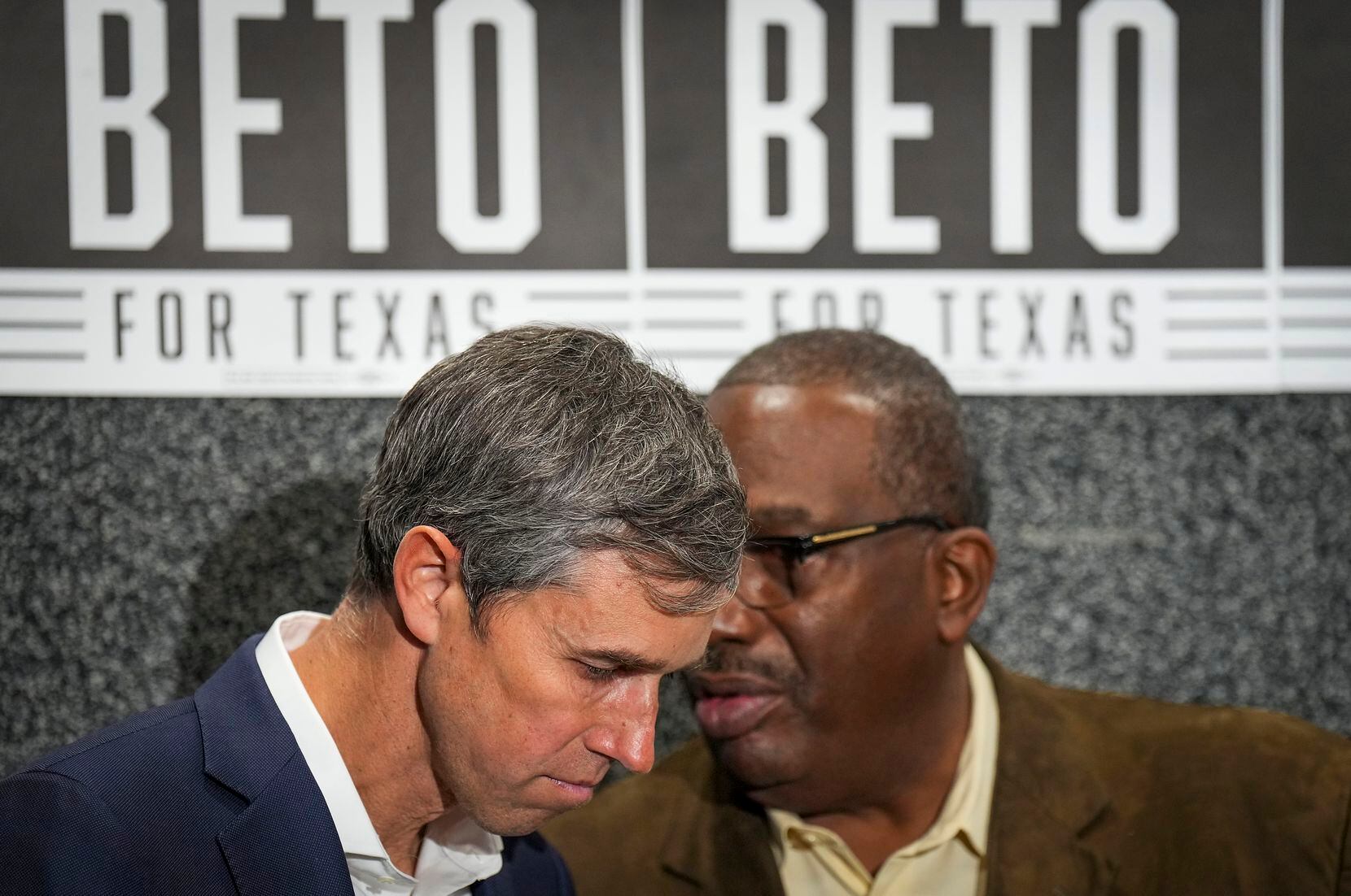 Democratic candidate for governor Beto O'Rourke listens as State Sen. Royce West whispers in...