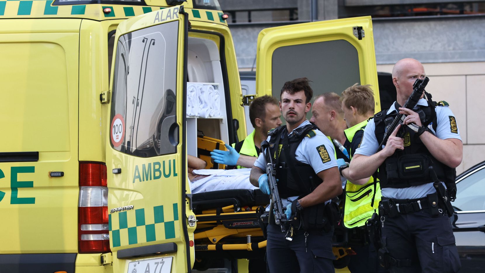 An ambulance and armed police outside the Field's shopping center, in Orestad, Copenhagen,...