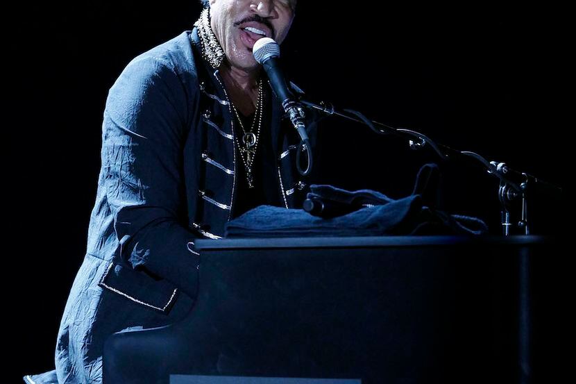 Lionel Richie performs for the crowd at Fair Park in Dallas on Tuesday, July 11, 2014. 