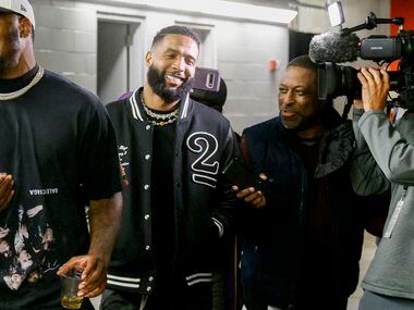 NFL free agent Odell Beckham Jr. (center) talks with The Dallas Morning News’ Dallas Cowboys...