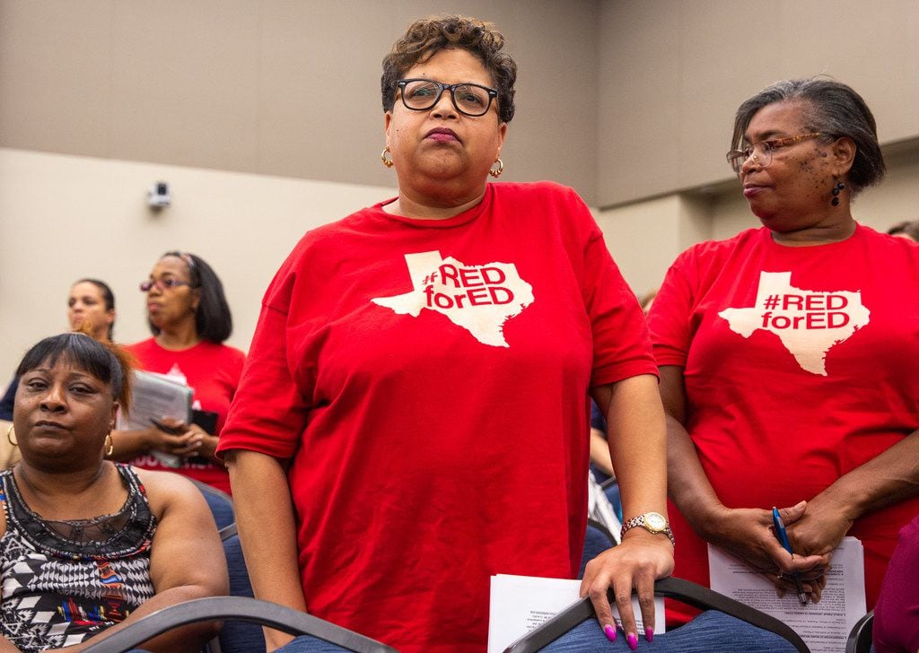 Media specialist Mary Smith (center) and teacher Vivian Bryant (right) were among Dallas...