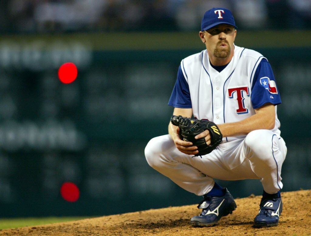 Texas Rangers relief pitcher Doug Brocail reacts after hitting New York base runner Miguel Cairo in the fourth inning at Ameriquest Field in Arlington Wednesday night, August 11, 2004. 