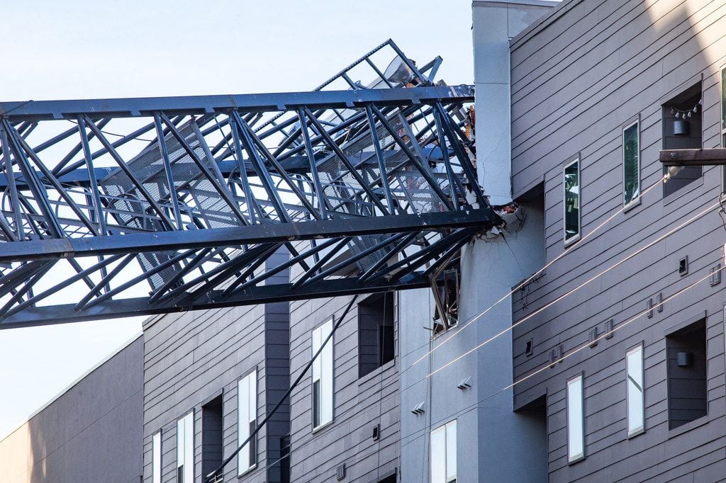 A construction crane fell at the Elan City Lights apartment complex in Dallas during a major...