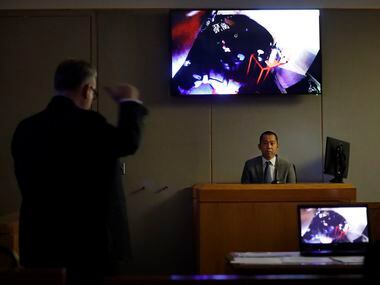 Dallas police officer Tu Nguyen is questioned by Assistant District Attorney Jason Hermus...