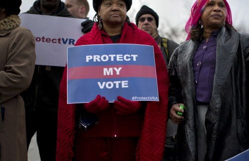 File: People wait in line outside the Supreme Court in Washington, Wednesday, Feb. 27, 2013,...