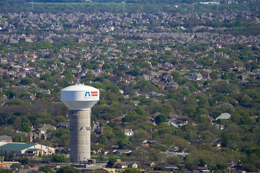 Aerial view of water tower and residential neighborhood in Allen, Texas on March 24, 2020.