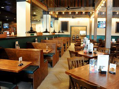 Booths from an old Snuffers location have a new home at Snuffers in Addison, TX on May 7,...