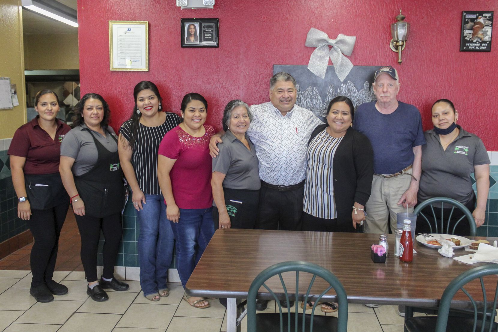 The staff of Acapulco’s stands with owner Refugio “Cuco” Bahena at Acapulco's in DeSoto, Texas on Thursday, June 10, 2021. (Elias Valverde II / Special Contributor)