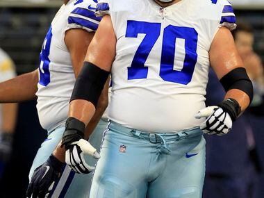 Dallas Cowboys offensive tackle Terence Steele (78) and offensive guard Zack Martin (70) are...